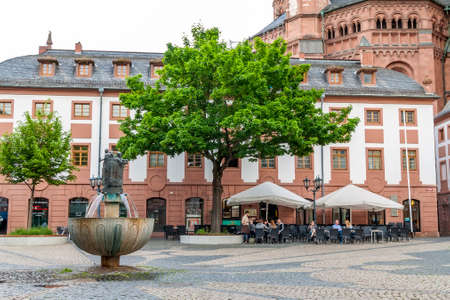 Mainz, Germany - June 12, 2017: People in outdoor restaurant under a big treeのeditorial素材