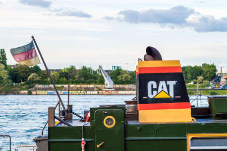Mainz, Germany - June 12, 2017: Caterpillar heavy duty equipment vehicle and logo. Caterpillar is a leading manufacturer of construction equipment.のeditorial素材