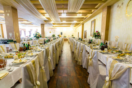 Ivano-Frankivsk, Ukraine - July 25, 2017: Restaurant interior view ready for wedding dinnerのeditorial素材