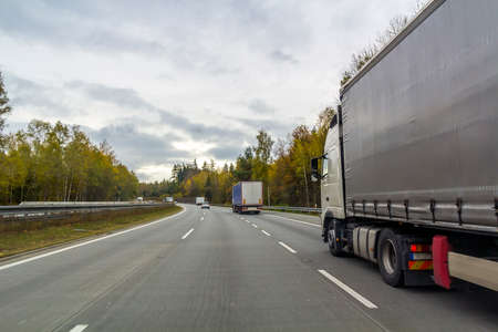 Truck on freeway road, cargo transportation concept