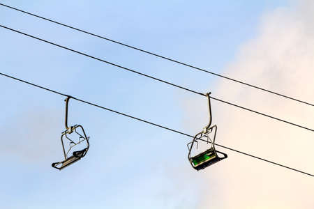 Ski lift with empty seats in ski resortの写真素材