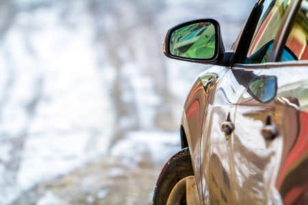 Close-up detail image of a car with side view mirrorの写真素材