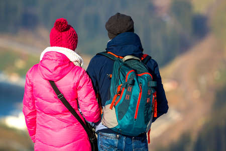 Tourists couple enjoying mountain view