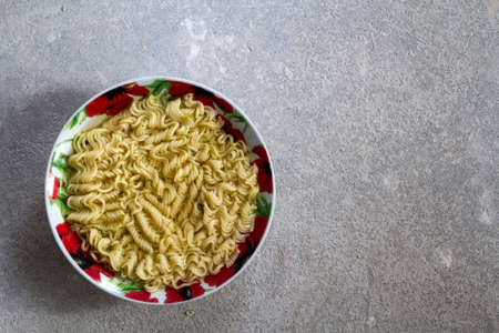 Plate full with spaghetti. Food backgroundの写真素材