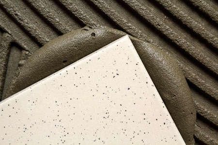 Ceramic tiles and tools for tiler. Floor tiles installation. Home improvement, renovation - ceramic...