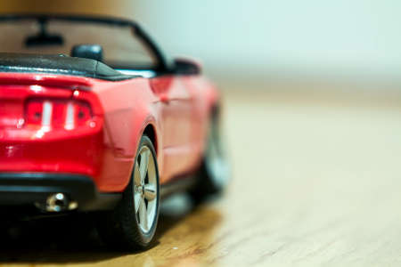 Close-up of rear view of red toy carの写真素材