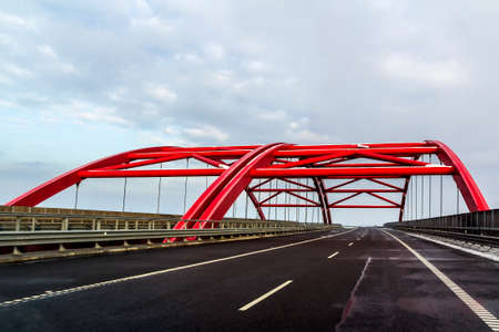 Metal frame structure of a bridge over a highway road