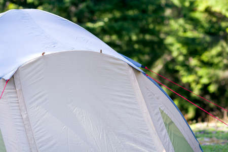 Close-up view of part of a tourist tent. Hikers camp detail.