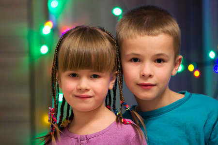 Happy children boy and girl together. Family portrait.