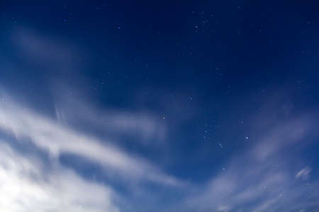 Beautiful fantastic bright high blue sky with soft puffy white clouds, symbol of purity and...