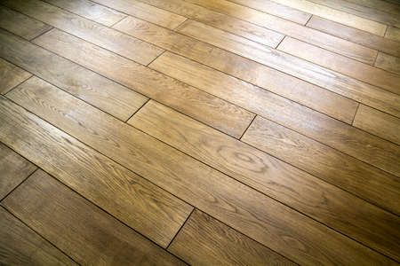 Natural brown texture wooden parquet floor boardsの写真素材