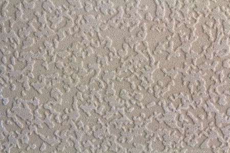 White light gray beige copy space background of natural cement or stone plastered stucco wall flat surface or cloth material crumpled texture as retro pattern. Vintage or grunge background.の写真素材