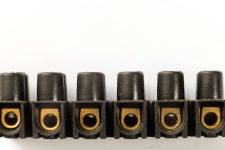 Terminal block electrical wires connector clips isolated on white copy space background. Electrician...