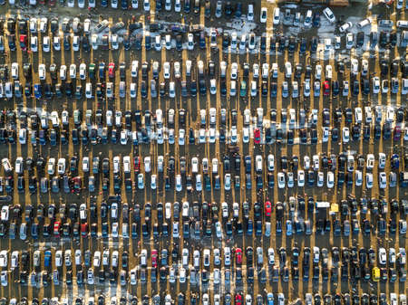 Aerial drone image of many cars parked on parking lot, top view.の写真素材