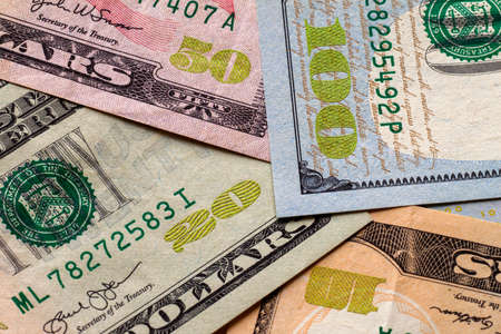 Money and finances concept. Abstract light background of American USA national currency banknotes,...