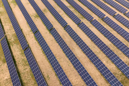 Aerial view of solar power plant. Electric panels for producing clean ecologic energy.