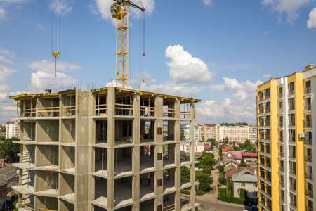 Apartment or office tall concrete building under construction.
