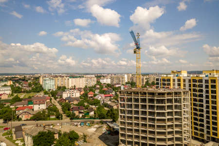 Apartment or office tall concrete building under construction.の写真素材
