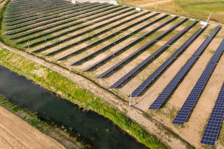 Aerial view of solar power plant. Electric panels for producing clean ecologic energy.