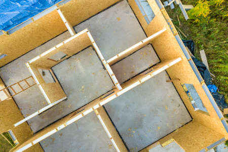 Construction of new and modern modular house. Walls made from composite wooden sip panels with...