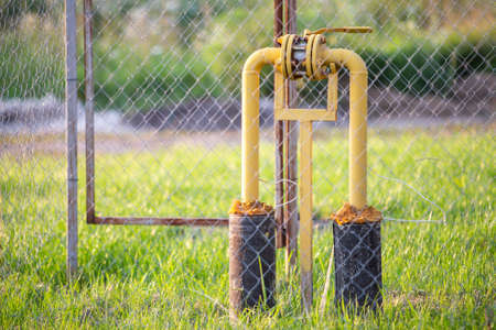 The gas valve on the yellow metal tube. Blocking damper on gas pipe.の写真素材