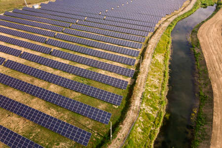 Aerial view of solar power plant. Electric panels for producing clean ecologic energy.