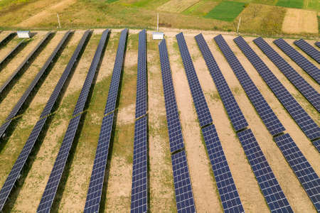 Aerial view of solar power plant. Electric panels for producing clean ecologic energy.