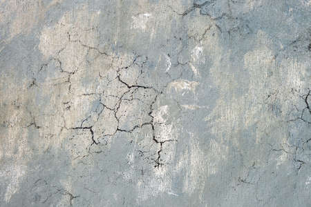 Weathered old grey cracked background with rough surface.