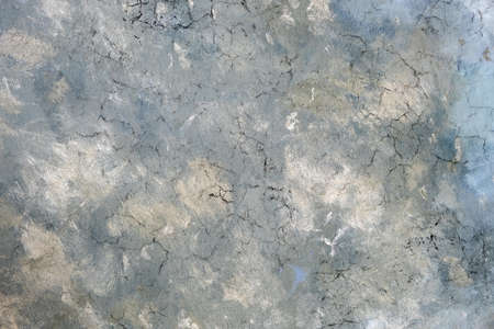 Weathered old grey cracked background with rough surface.