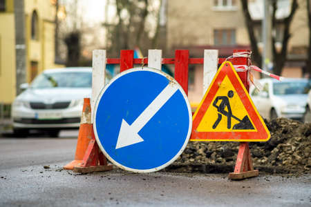 Warning street sign on road work site.の写真素材