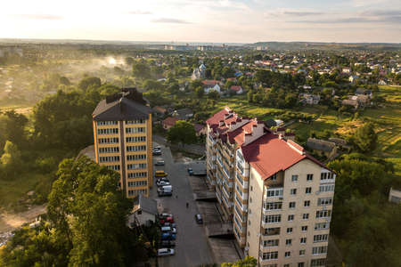 Aerial view of multistory apartment buildings in green residential area.の写真素材