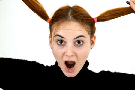 Close up portrait of pretty redhead teenage girl.の写真素材