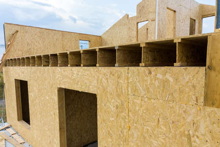 Construction of new and modern modular house. Walls made from composite wooden sip panels with foam...