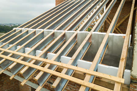 Stainless steel roof structure for future roof under construction. Development of metal roofing...