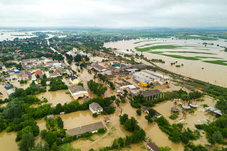 Aerial view of flooded houses with dirty water of Dnister river in Halych town, western Ukraine.