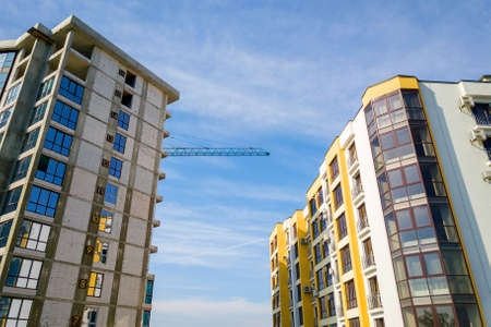 High residential apartment building under construction. Real estate development.