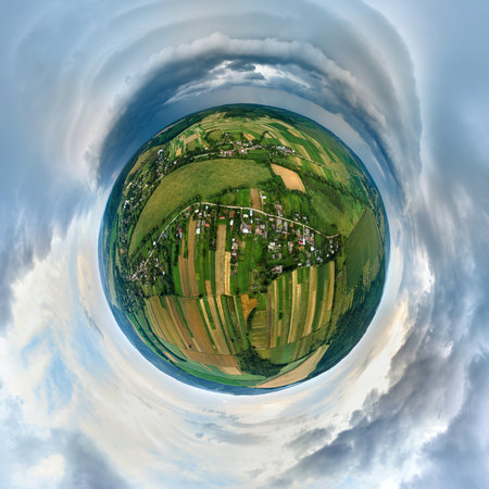 Landscape of dark clouds forming on stormy sky during thunderstorm over rural area.の写真素材