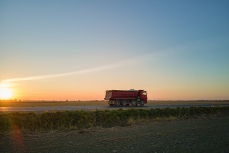 Aerial view of cargo truck driving on highway hauling goods. Delivery transportation and logistics conceptの写真素材