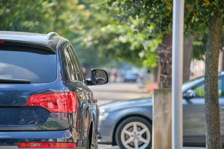 Close up of a car parked illegally against traffic rules on pedestrian city street side