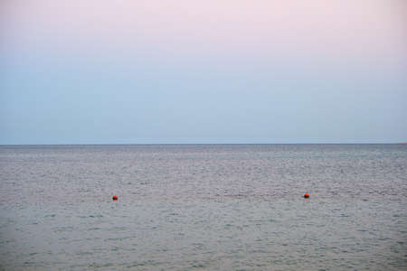 Closeup seascape surface of blue sea water with small ripple wavesの写真素材