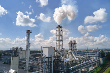 Aerial view of oil and gas refining petrochemical factory with high refinery plant manufacture...