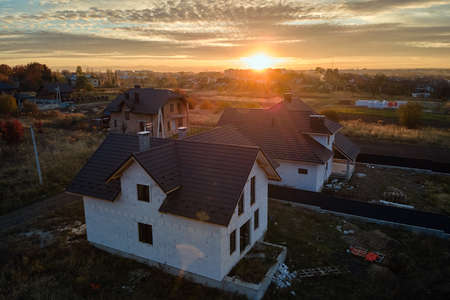 Aerial view of unfinished house with aerated lightweight concrete walls and wooden roof frame...
