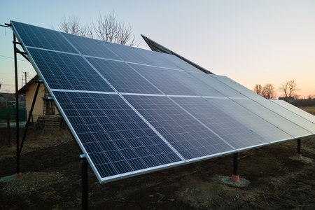 Solar photovoltaic panels for producing of clean ecological electrical energy mounted on backyard...