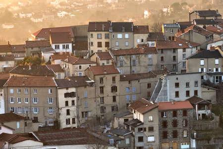Aerial view of dense historic center of Thiers town in Puy-de-Dome department, Auvergne-Rhone-Alpes...