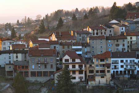 Aerial view of dense historic center of Thiers town in Puy-de-Dome department, Auvergne-Rhone-Alpes...