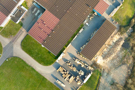 Aerial view of modern factory structure for production and distribution of industrial equipment. Concept of global industryの写真素材