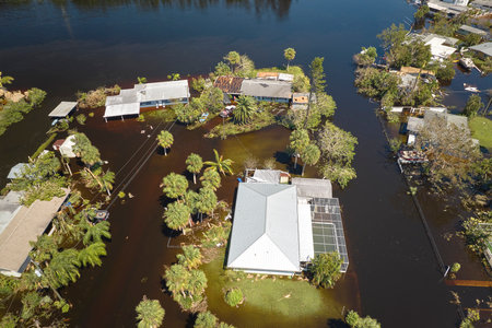 Hurricane Ian flooded houses in Florida residential area. Natural disaster and its consequencesの写真素材