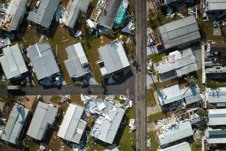Badly damaged mobile homes after hurricane Ian in Florida residential area. Consequences of natural disasterの写真素材