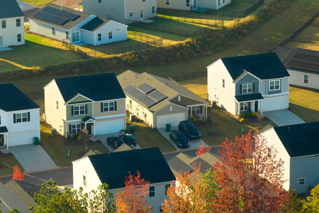 Aerial view of tightly packed homes in South Carolina residential area. New family houses as example of real estate development in american suburbsの写真素材
