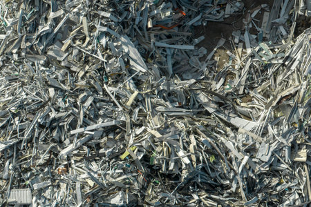 Beg pile of scrap aluminum metal siding from ruined houses after hurricane Ian swept through...